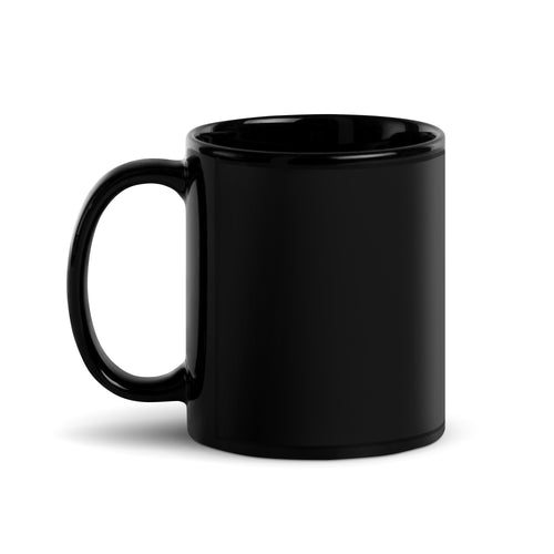 Side view of black ceramic "Duly Noted." mug